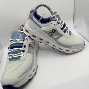 On Running Women's Trail Shoes in White, Light Blue, and Purple